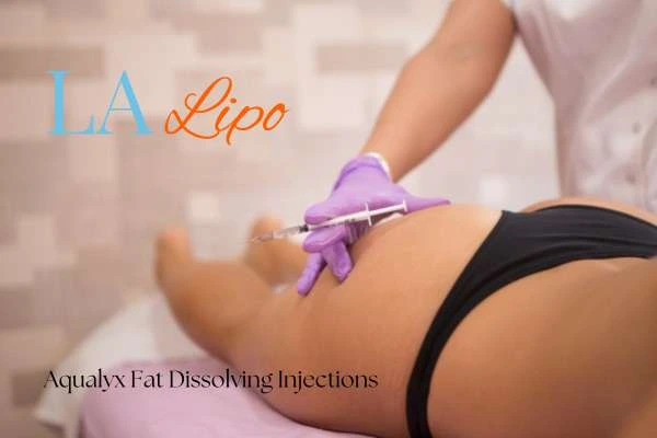 Woman having fat dissolving injections Isleworth on thighs