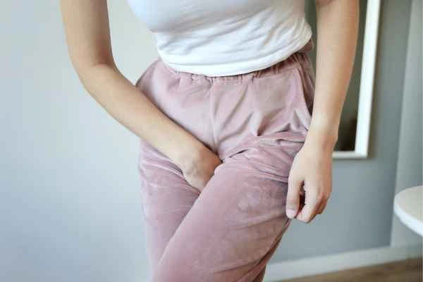 woman running for the toilet because of urinary incontinence Isleworth